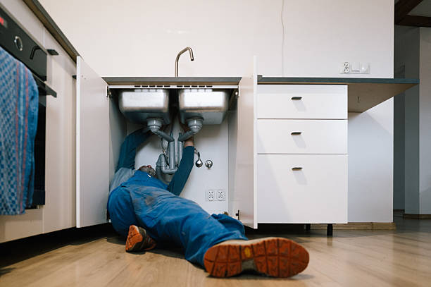 Professional Emergency Plumber technician working in Buxton, NC